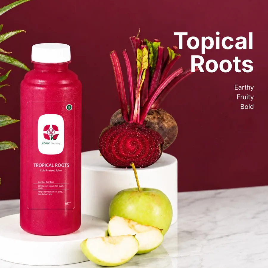Tropical Roots di atas meja dengan bahan segarnya
