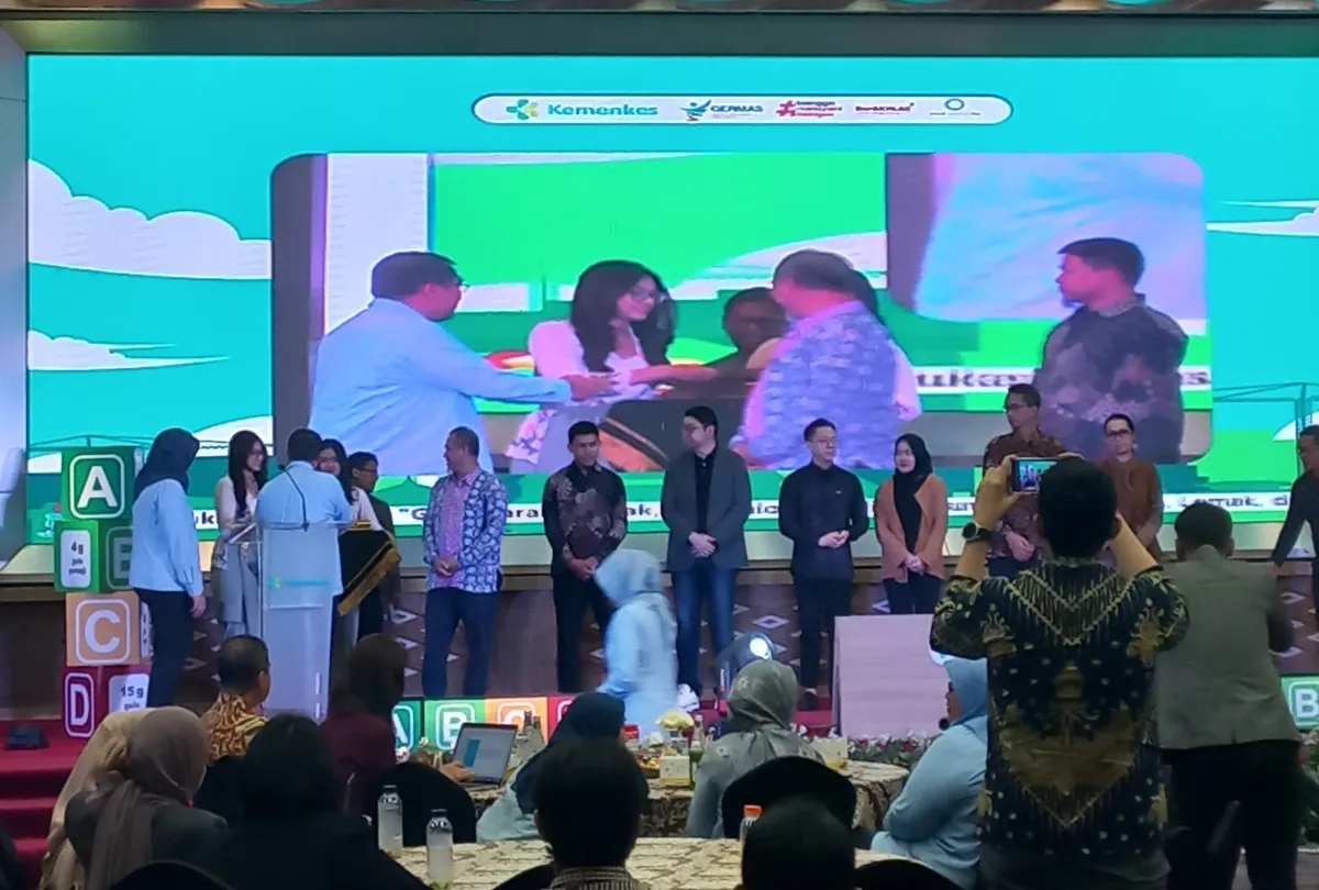 Panggung acara Edukasi GGL Kementerian Kesehatan dengan peserta di depan layar
